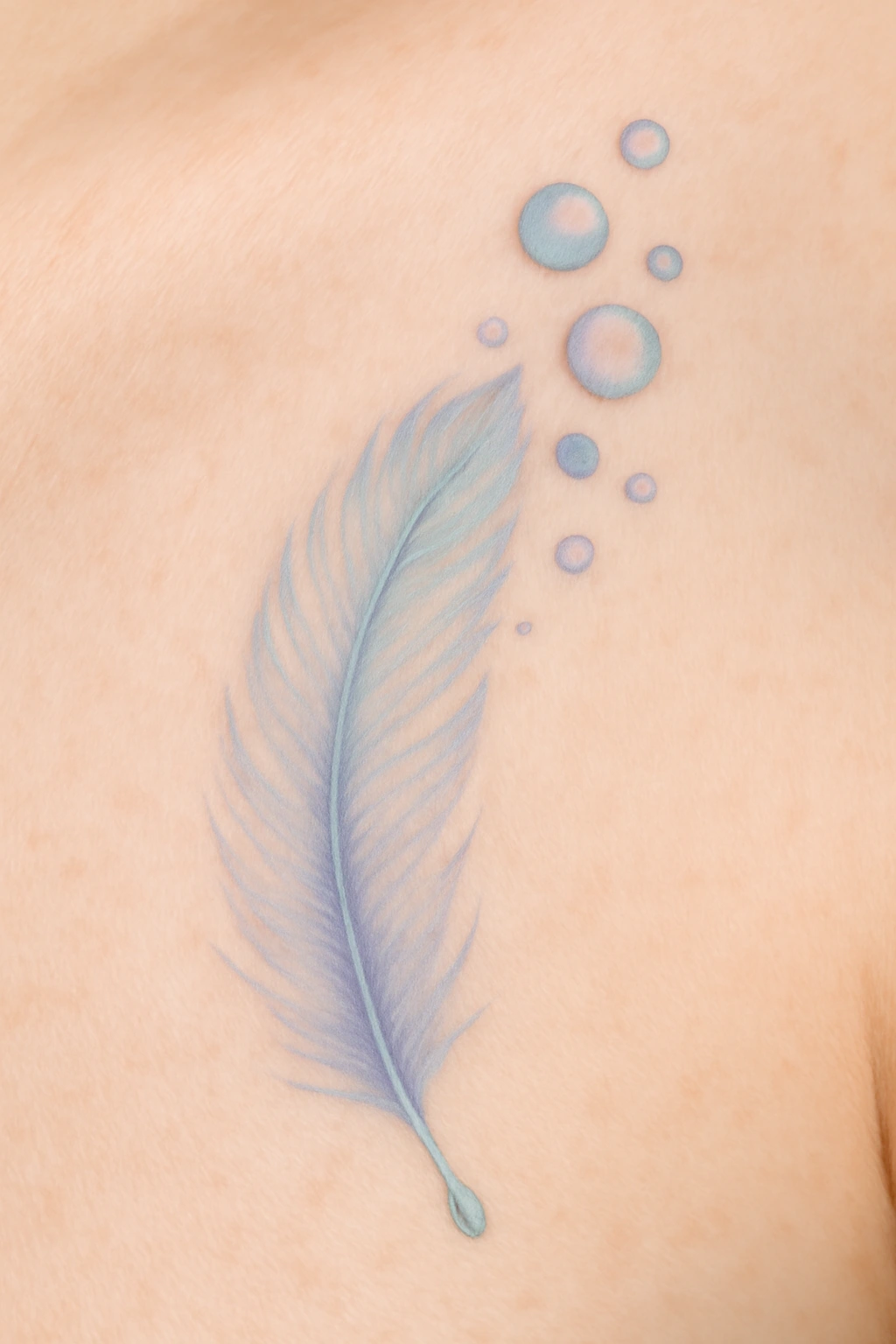 22. Delicate Feather with Bubble Accents — “Lightness Within”